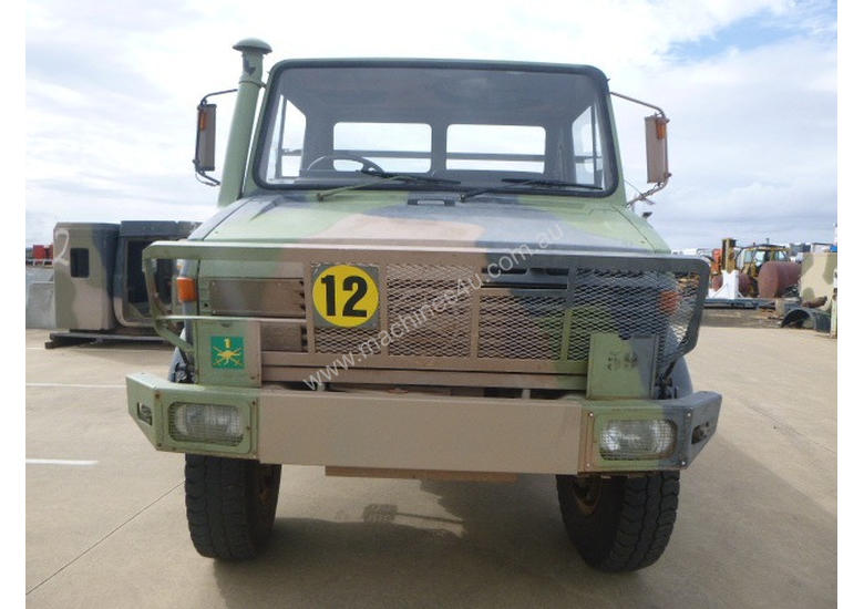 caption Mercedes Benz UNIMOG Tray Truck
