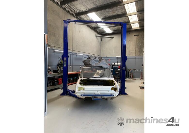 caption BulletPro 2 Post Clear Floor Lift - BP40M: 4-Ton Capacity, Truck Adaptors Included