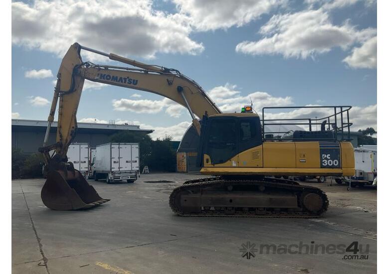 caption Komatsu PC300-7 Excavator