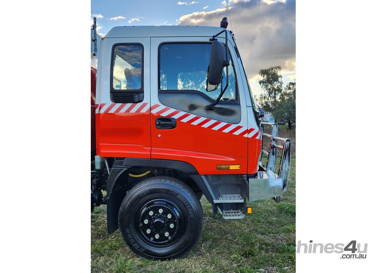 caption Isuzu FSS500 4X4 Single Cab Traytop Firetruck. Ex NSW Rural Fire Service