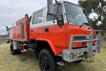 Isuzu FTS700 4x4 Crewcab Traytop Firetruck. Ex NSW Rural Fire Service. Isuzu FTS700 4x4 Crewcab Traytop Firetruck. Ex NSW Rural Fire Service.