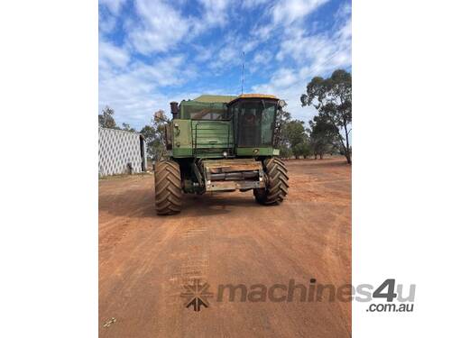 1985 John Deere 8820 with 30ft front & comb trailer