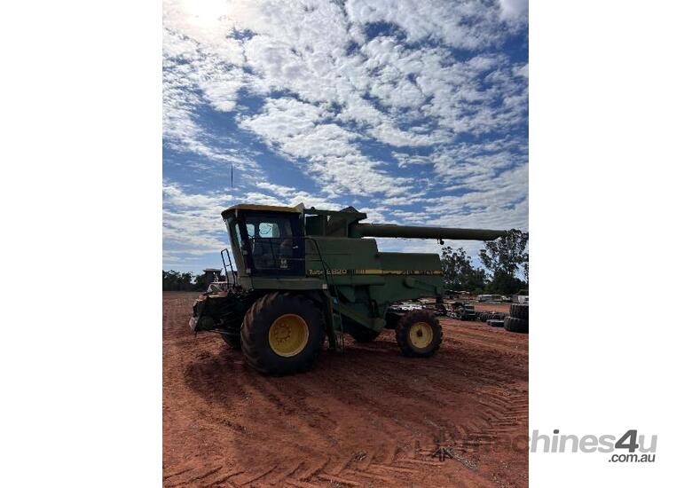 1985 John Deere 8820 with 30ft front & comb trailer