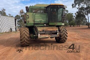 1985 John Deere 8820 with 30ft front & comb trailer
