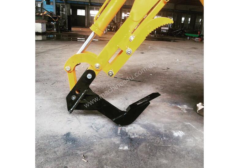 caption Backhoe – Ripper Attachment