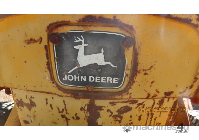 caption John Deere Backhoe