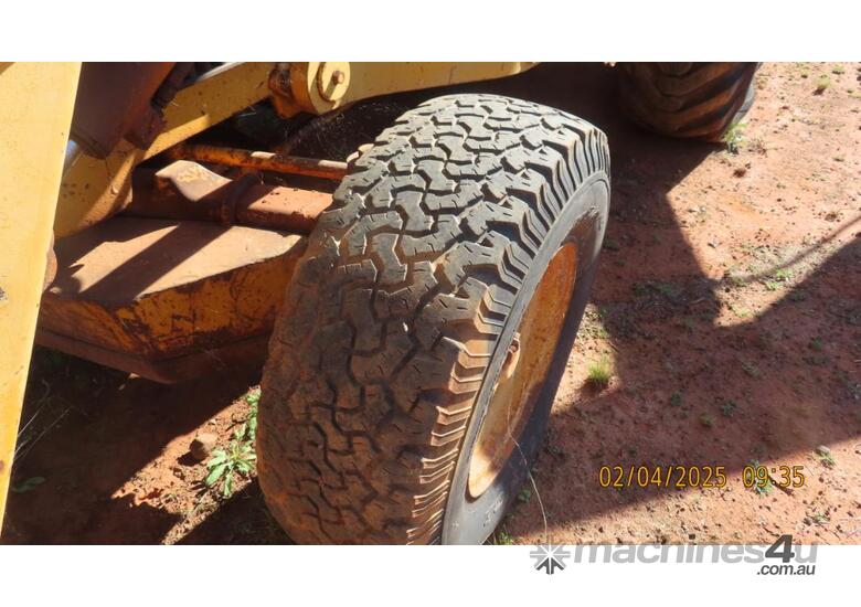 caption John Deere Backhoe