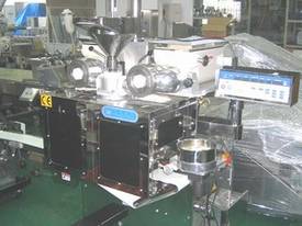 Automatic Encrusting machines for 2 fillings - picture0' - Click to enlarge
