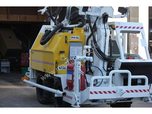 Shotcrete - The worlds most compact self contained robotic shotcrete rig.