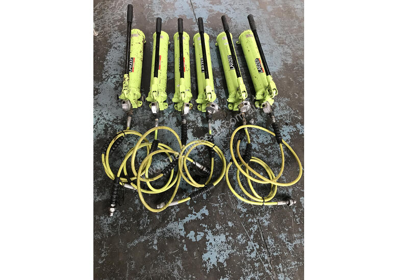 Used Larzep Larzep Hydraulic Porta Power Hand Pump Two Speed c w Hose