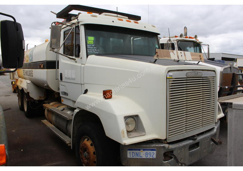 caption Freightliner 1995 FL112 Water Cart