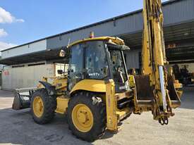 2012 KOMATSU BIG WHEEL BACKHOE U4699 + Attachments Included! - picture1' - Click to enlarge