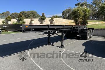 1991 Howard Porter Tandem Axle Flat Top Trailer