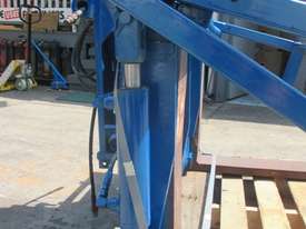 Rotating Fork /Bin Hold Down, Forklift Attachment - picture0' - Click to enlarge