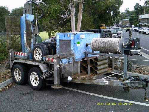 drilling rig , tandem trailer mount , 3cyl perkins / cat powered