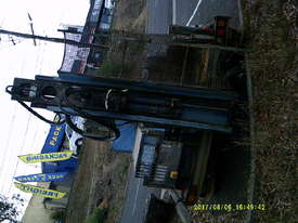 drilling rig , tandem trailer mount , 3cyl perkins / cat powered - picture2' - Click to enlarge