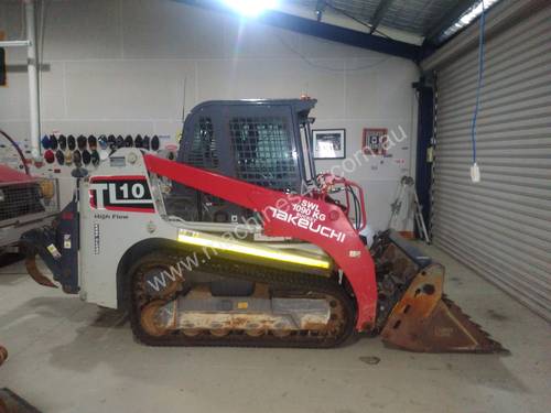 Takeuchi TL10 track loader with rippers and fork tines