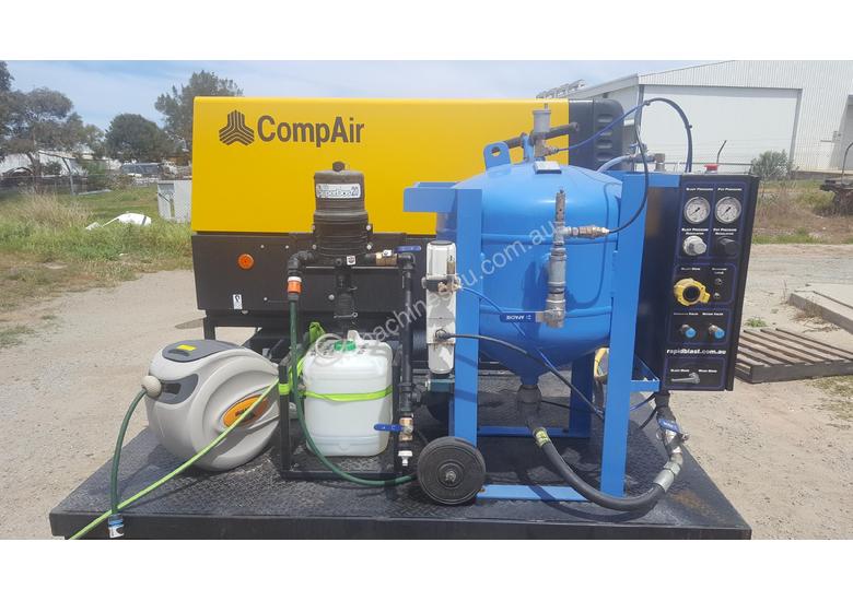 caption MOBILE DUSTLESS BLASTING TRAILER