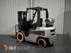 Nissan 2.5 Tonne Forklift with Fork Positioner and Sideshift LPG EFI Markless Tyres Container Mast - picture0' - Click to enlarge