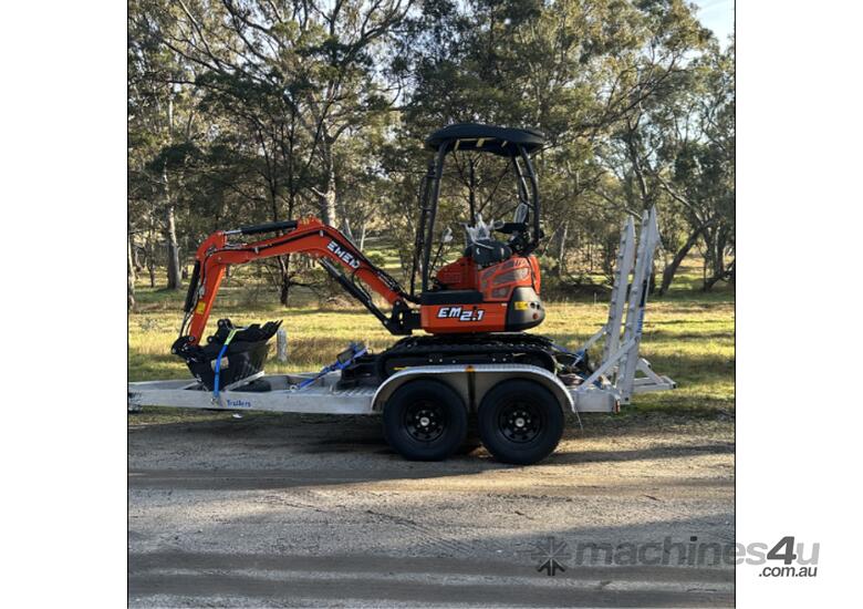 caption Excavator 2 Tonne & trailer package with Auger, Rock Breaker & FREE Attachments.