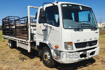 Mitsubishi Fuso Fighter 1024 4x2 Traytop Truck with Tailgate Loader. One Owner Ex Origin Gas.