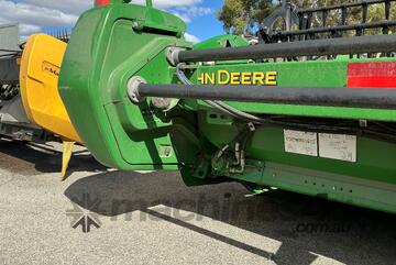 John Deere   740D