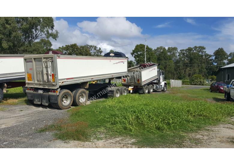 caption Truck and dog