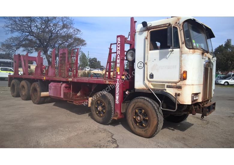 caption Kenworth K100E Cab Chassis Tri Drive Tandem Steer 10X6