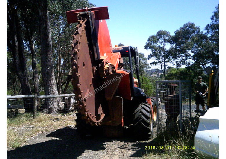 caption RT-115 rocksaw , 2006 model , 1500hrs , H-911 trencher available