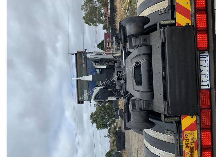 caption 2003 Volvo Hook lift FM 12