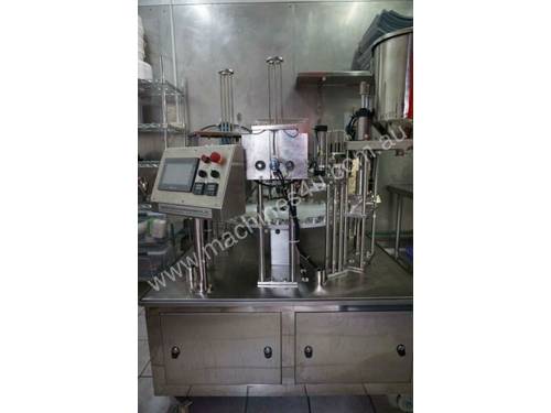 Popsicle filling and sealing machine with Chicago Hush5000 Aircompressor