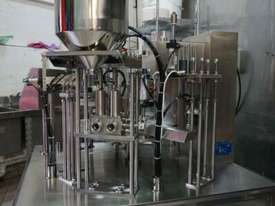 Popsicle filling and sealing machine with Chicago Hush5000 Aircompressor - picture0' - Click to enlarge