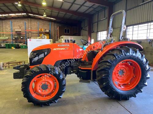 KUBOTA M7040SU 70 HP TRACTOR , AS NEW CONDITION , 386 HOURS T/T , 2014 MODEL ,4 WD .