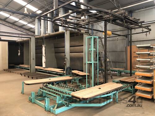 Three stainless steel spray booths with overhead chain & floor carriage conveyors & heated section
