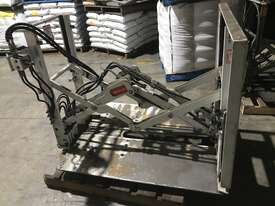 East West Push Pull forklift attachment  for loading from Chep into shipping container - picture0' - Click to enlarge