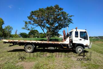 PACIFC ENERGY GROUP -   - 4x2 WD Tilt Tray Truck with Palfinger PC2300 Vehicle Loading Crane PACIFC ENERGY GROUP -   - 4x2 WD Tilt Tray Truck with Palfinger PC2300 Vehicle Loading Crane