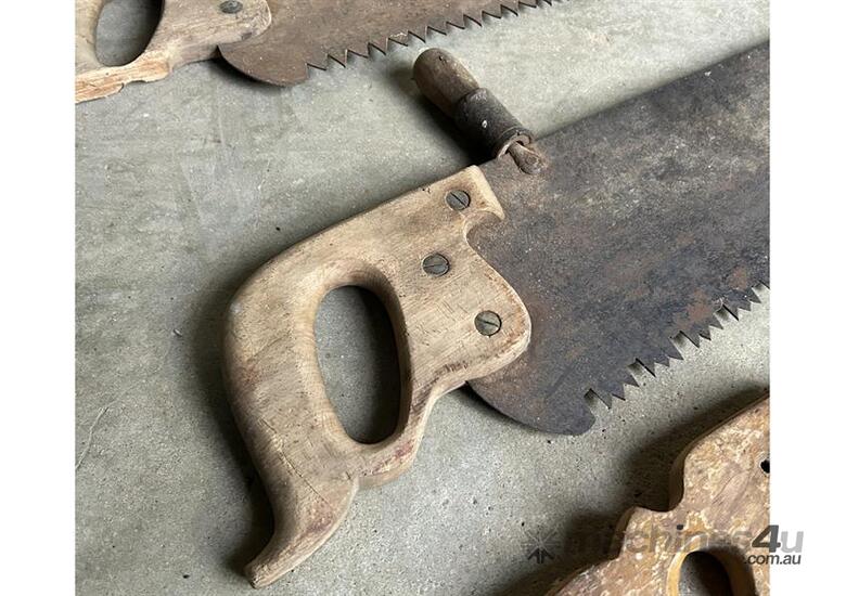 caption QTY X 3 ANTIQUE SAWS