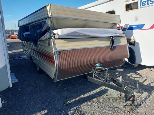 caption Jayco Swan POP Top