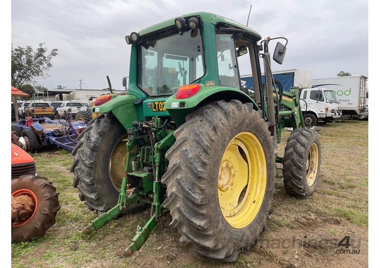 caption John Deere 6420 Tractor / Loader