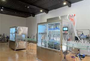 12 Head Gravity Filling Line with Cap Feeder and Capping Machine