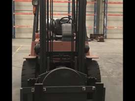 Nissan Forklift with the Rotary Attachment - picture0' - Click to enlarge