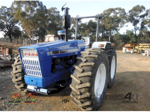 (7617) Ford County 1164 Tractor (Maryborough, VIC)