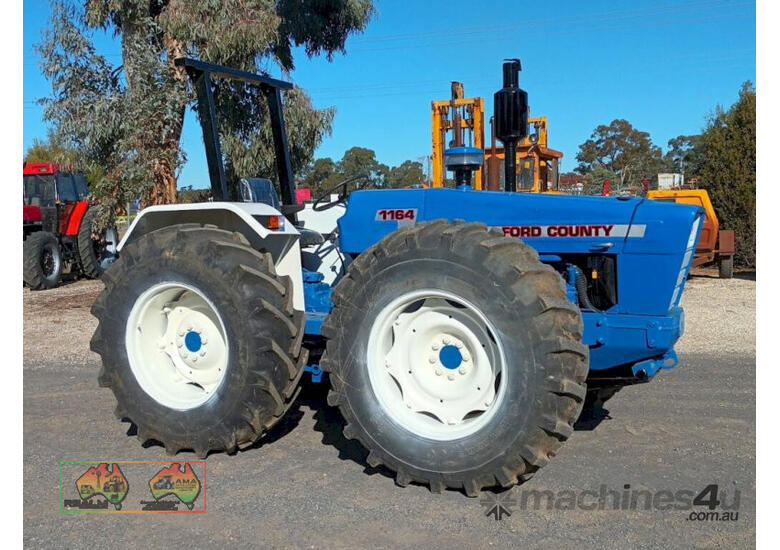 (7617) Ford County 1164 Tractor (Maryborough, VIC)