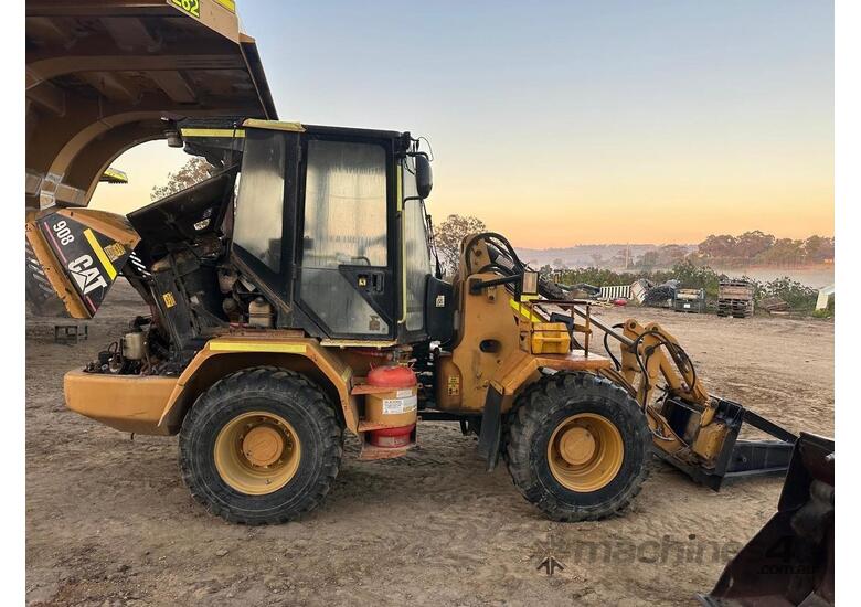 caption 2004 Caterpillar 908 Wheel Loader – Low Hours, 4-in-1 Bucket & Attachments