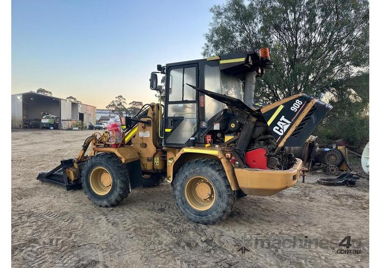 caption 2004 Caterpillar 908 Wheel Loader – Low Hours, 4-in-1 Bucket & Attachments