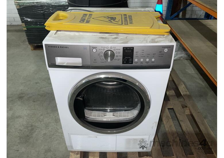caption Pallet of Bins, Wet Floor Sign and Washing Machine