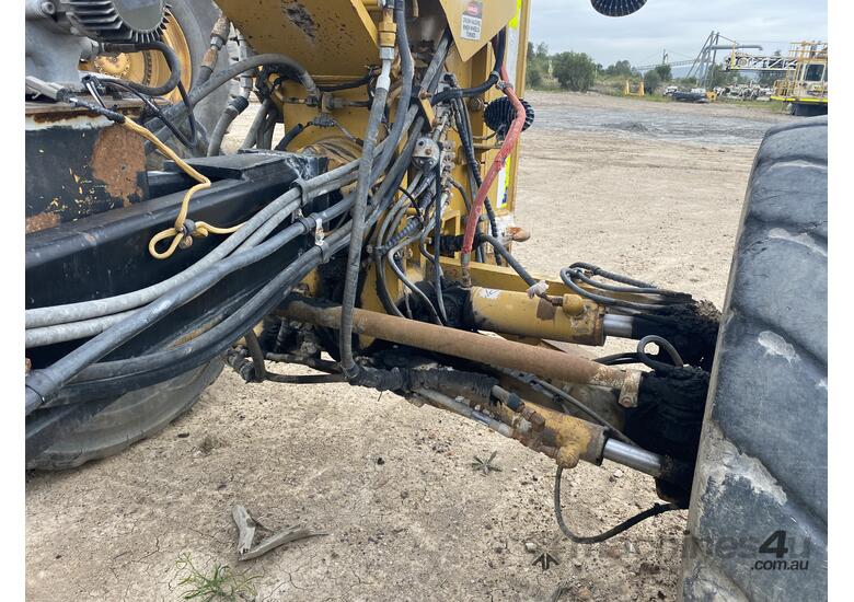 caption 2011 Caterpillar 16M Motor Grader