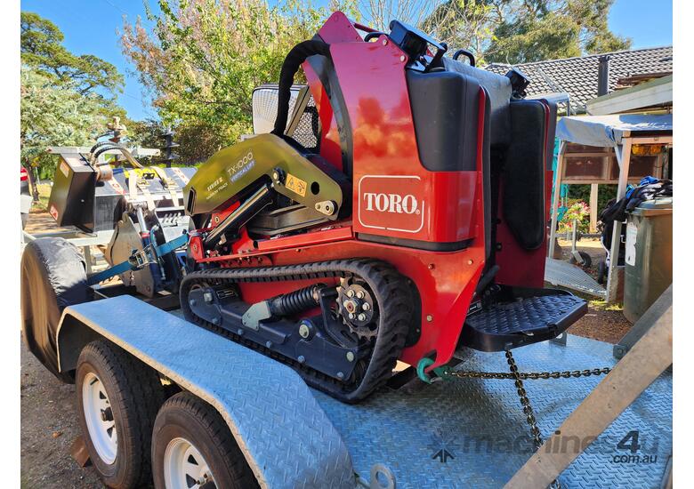 Toro TX1000 (low hours) + Plant Trailer + Attachments