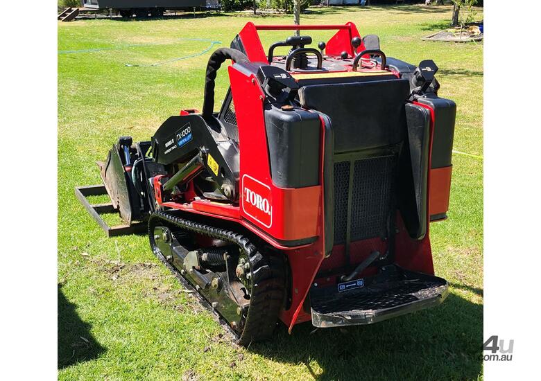 Toro TX1000 (low hours) + Plant Trailer + Attachments