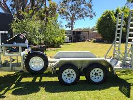 Toro TX1000 (low hours) + Plant Trailer + Attachments - picture1' - Click to enlarge